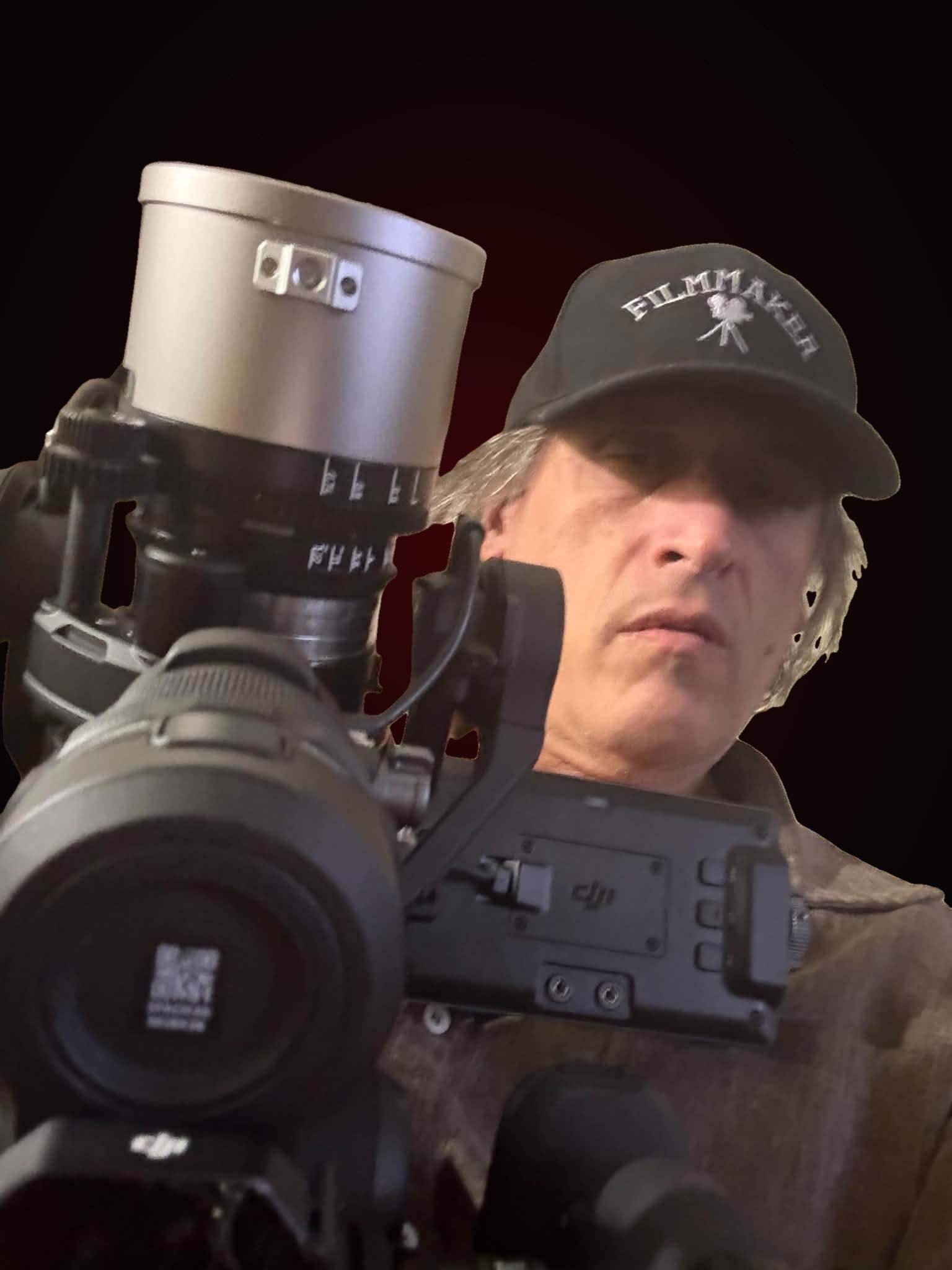 George S. Pogacich in FILMMAKER hat with cinema camera