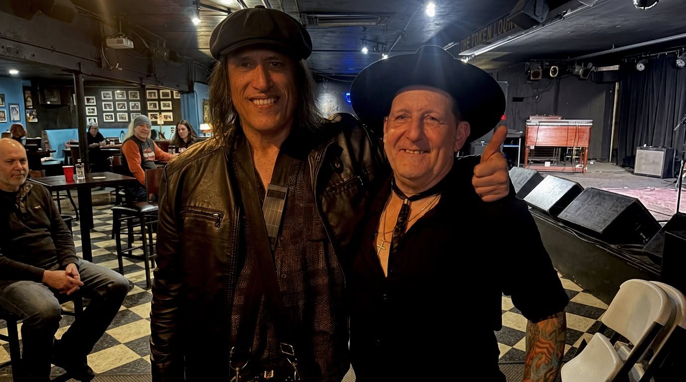 George S. Pogacich with a performer at the Dick Wagner Memorial
